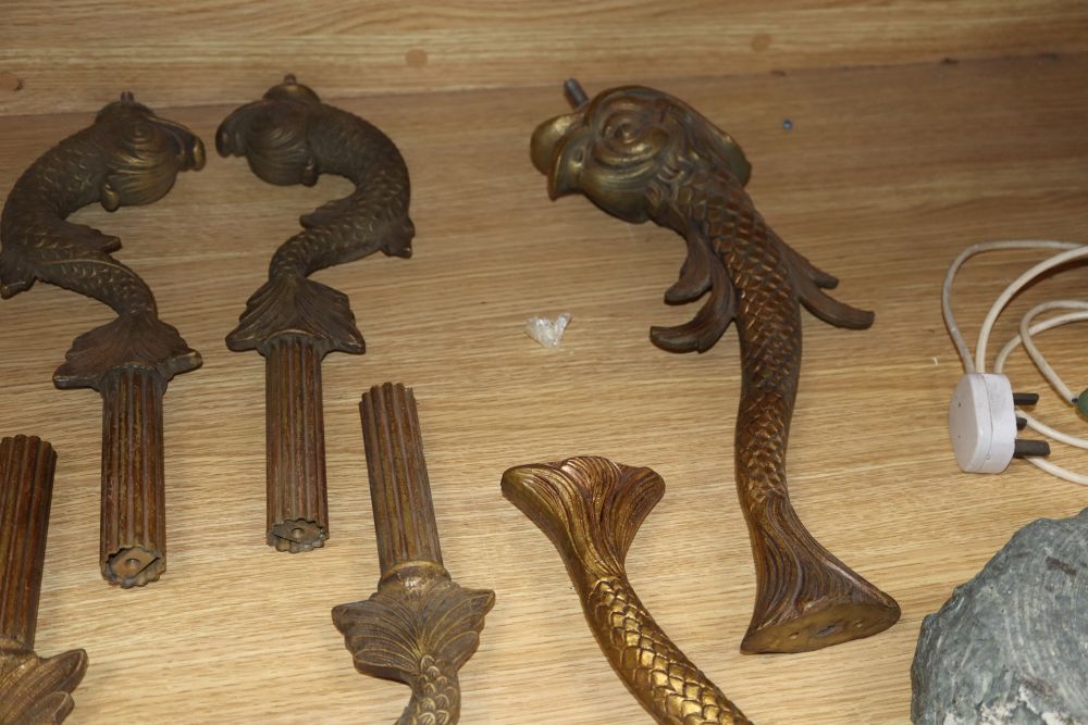 Two sets of four gilt metal dolphin supports, longest excluding screw thread 39cm